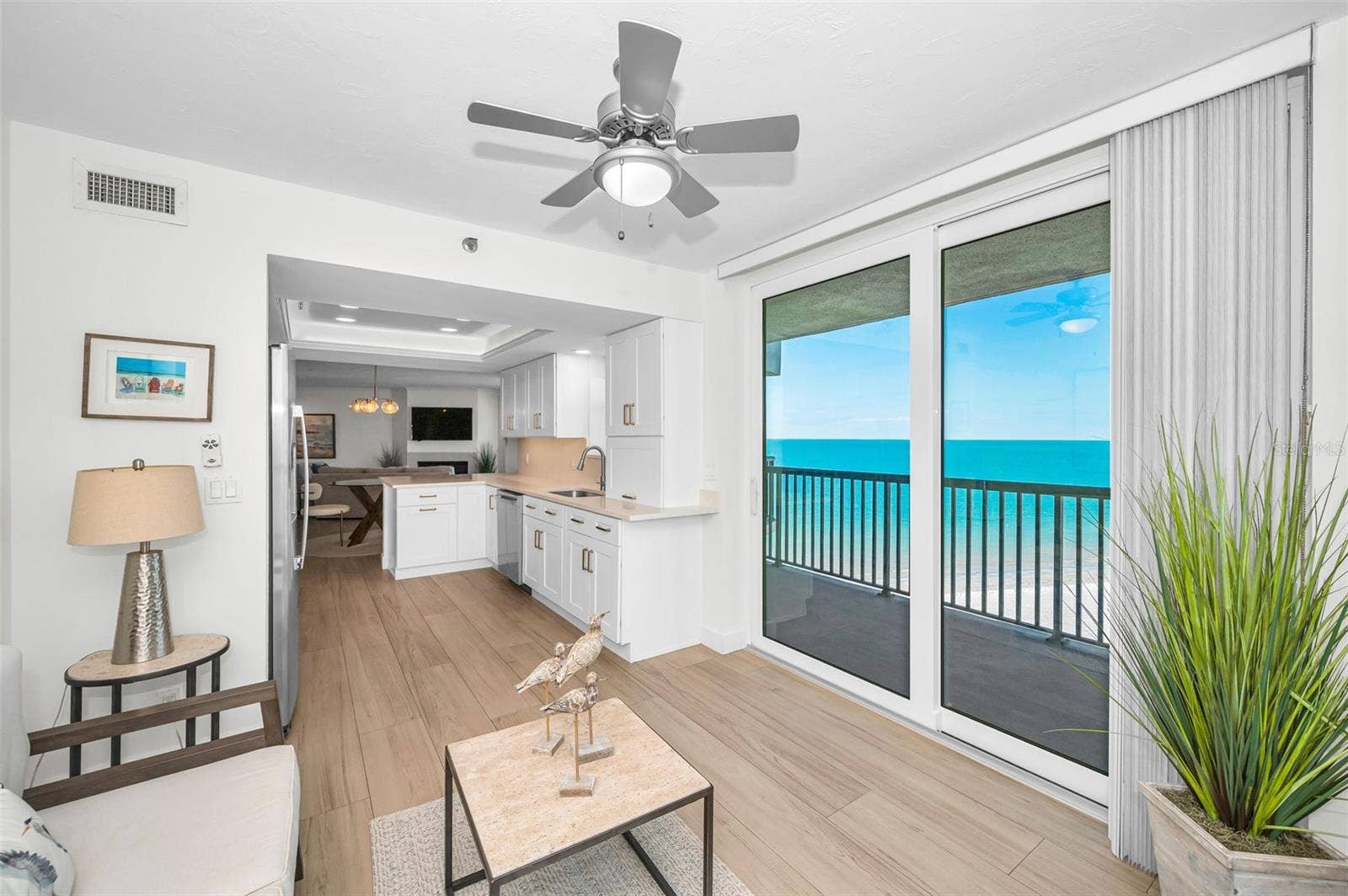 Back into the Sitting area / Sunroom with sweeping water views!