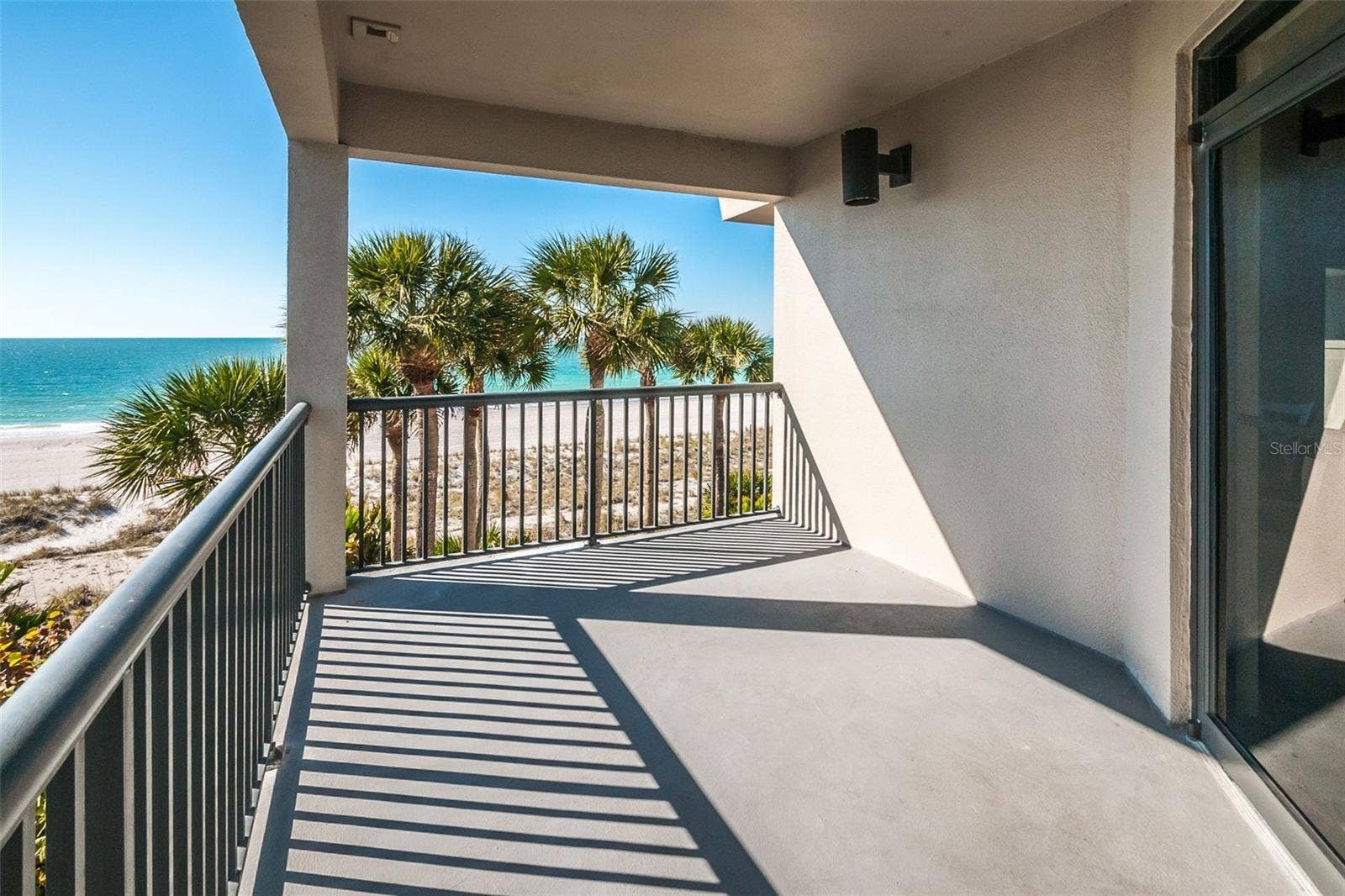 One of two Gulf front balconies off the clubroom