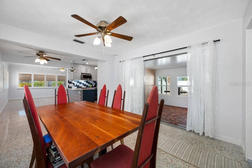 1472 DURLING DRIVE S, South Pasadena, FL 33707 Dining Room with Views of Bonus Room, Kitchen and Living Room