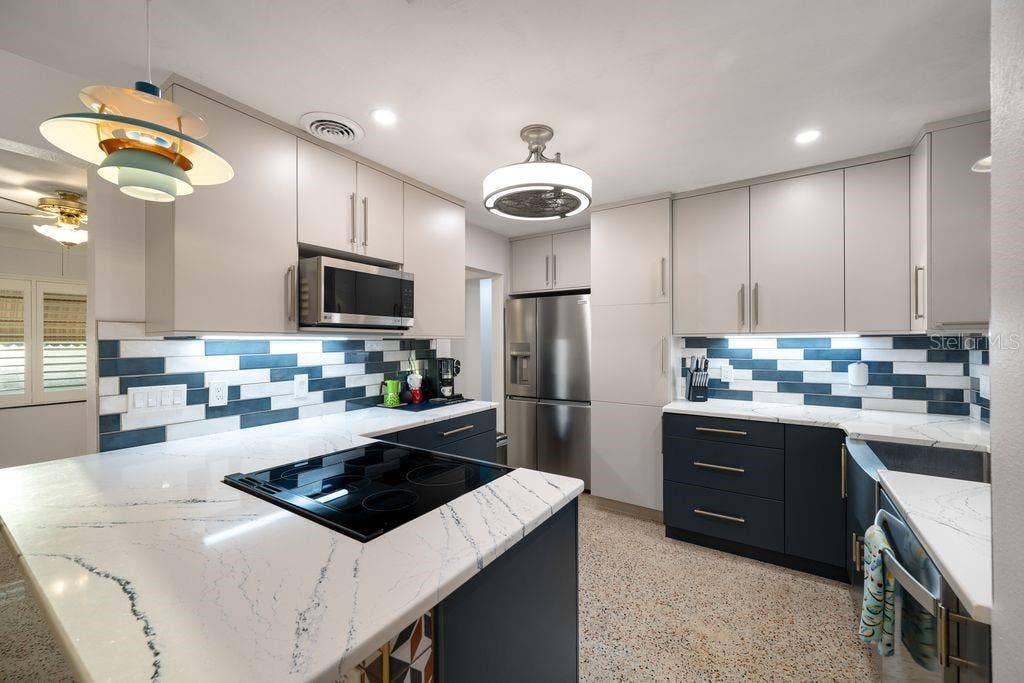 1472 DURLING DRIVE S, South Pasadena, FL 33707 New Two Tone KitchenCraft Cabinets - Quartz Countertops and Pretty Tile Backsplash