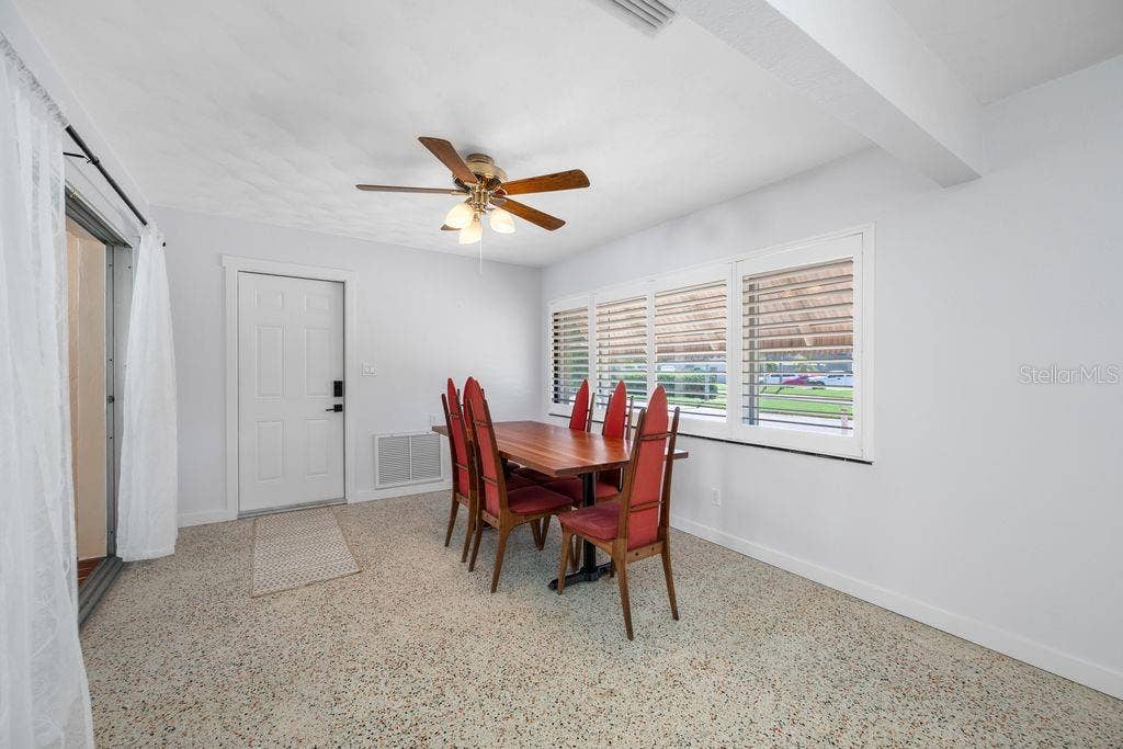 1472 DURLING DRIVE S, South Pasadena, FL 33707 This space is currently used as a Dining Room - another option could be a Family Room - Pedestrian Door to Garage