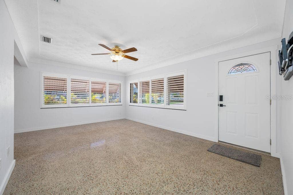 1472 DURLING DRIVE S, South Pasadena, FL 33707 View from Hallway - Front Door and Living Room