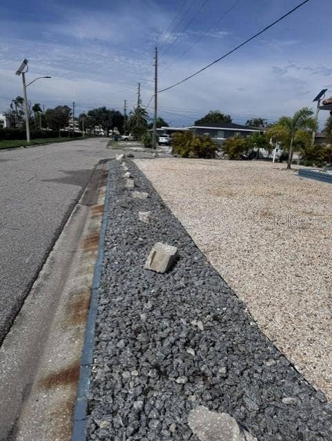 1472 DURLING DRIVE S, South Pasadena, FL 33707 Palms removed on Garage Side to improve traffic visibility