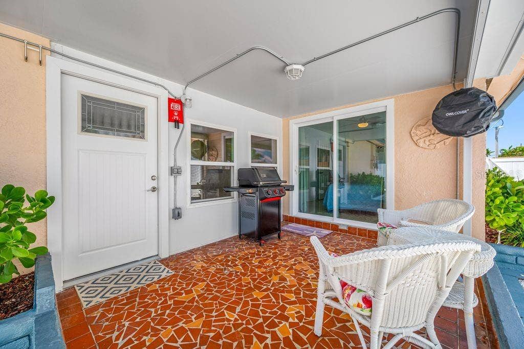 1472 DURLING DRIVE S, South Pasadena, FL 33707 Enjoy your covered Lanai - Access from the Bonus Room or Primary Bedroom