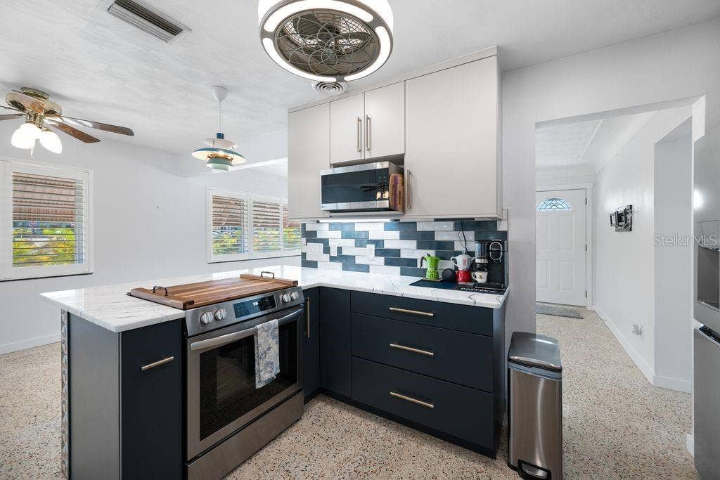 1472 DURLING DRIVE S, South Pasadena, FL 33707 Breakfast Bar - Custom Made Cutting Board for the Cooktop