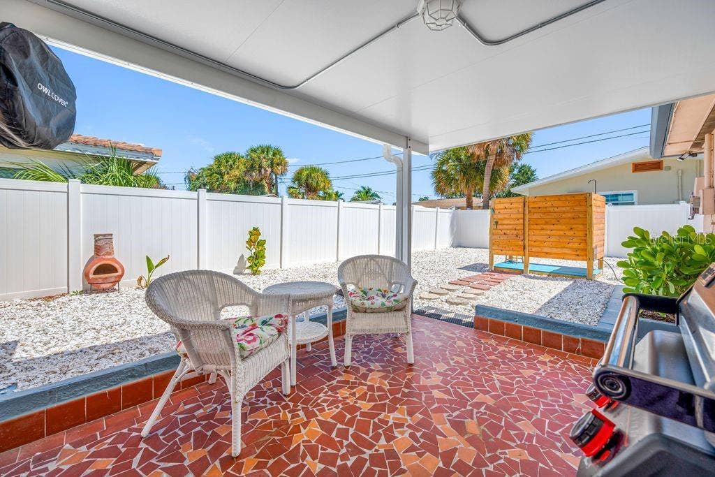 1472 DURLING DRIVE S, South Pasadena, FL 33707 Covered Lanai and your own private Cold Water Shower