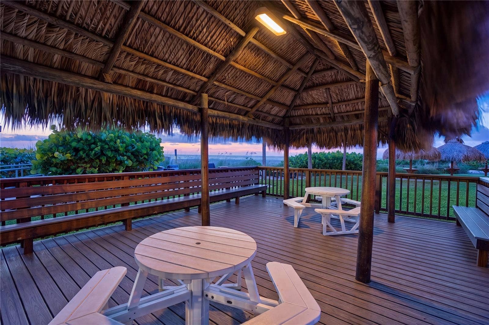 1480 GULF BOULEVARD, #601, Clearwater Beach, FL 33767 beachfront tiki hut at sunset