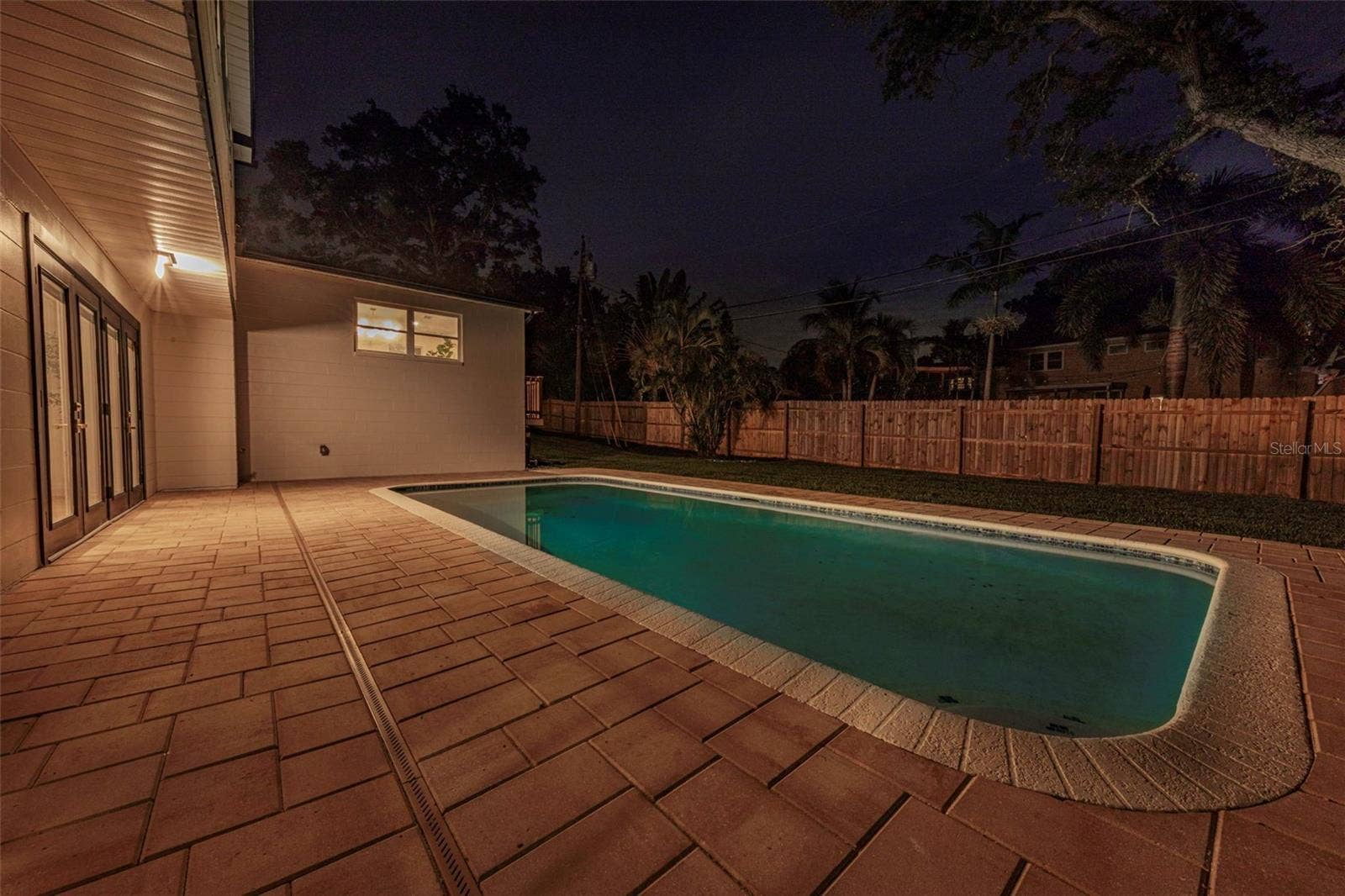 8209 134TH STREET, Seminole, FL 33776 Pool - Twilight