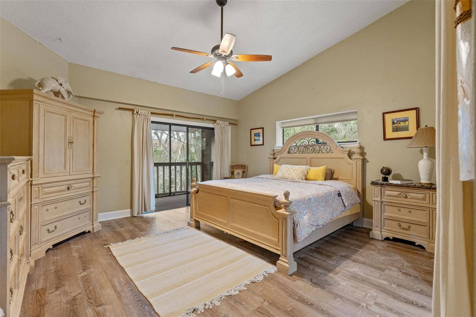 5155 S GRAY PELICAN WAY, Homosassa, FL 34448 Primary Bedroom, which also features a screened-in porch and a walk-in closet.