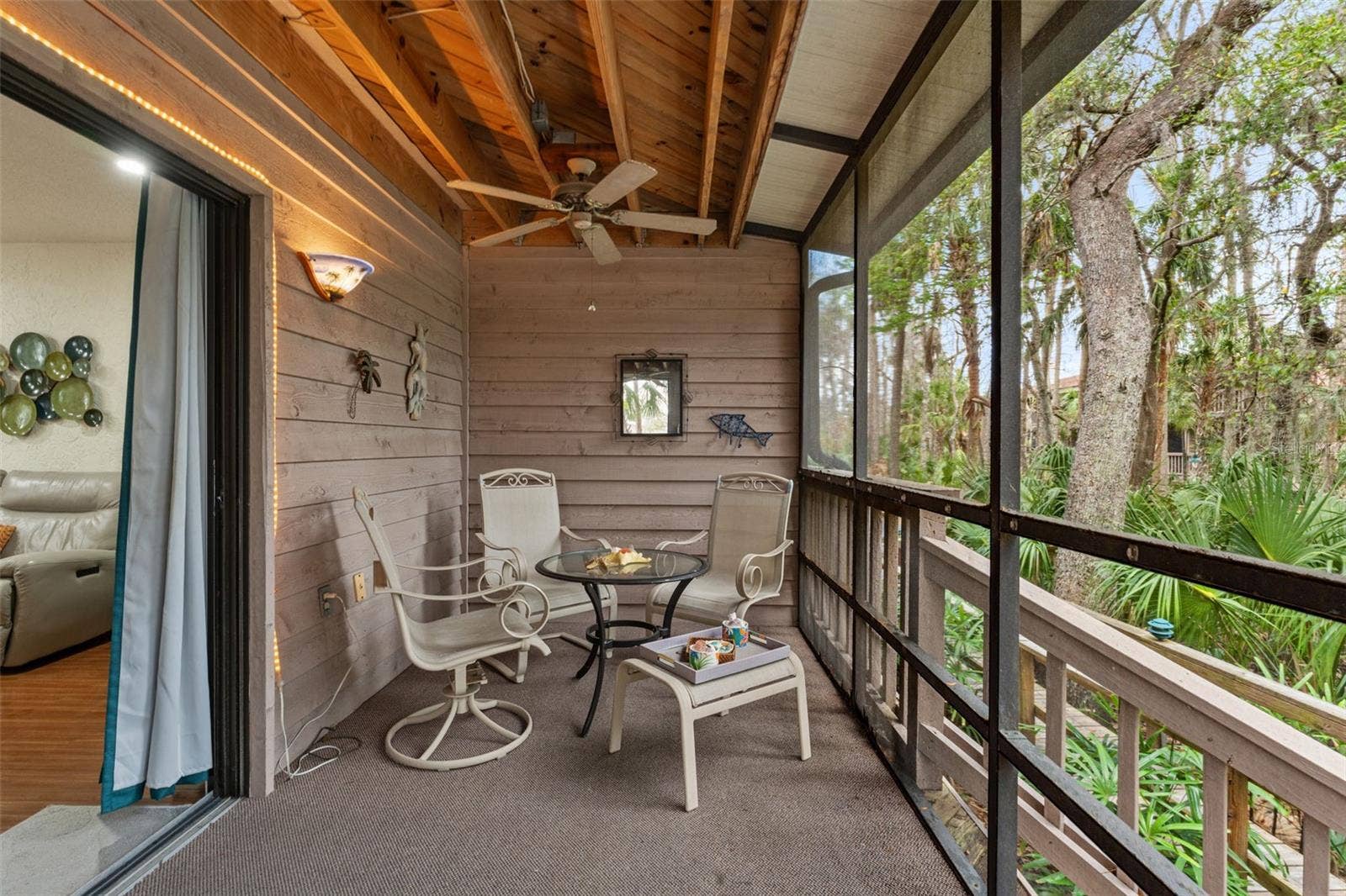 5155 S GRAY PELICAN WAY, Homosassa, FL 34448 Screened-in porch off the living room