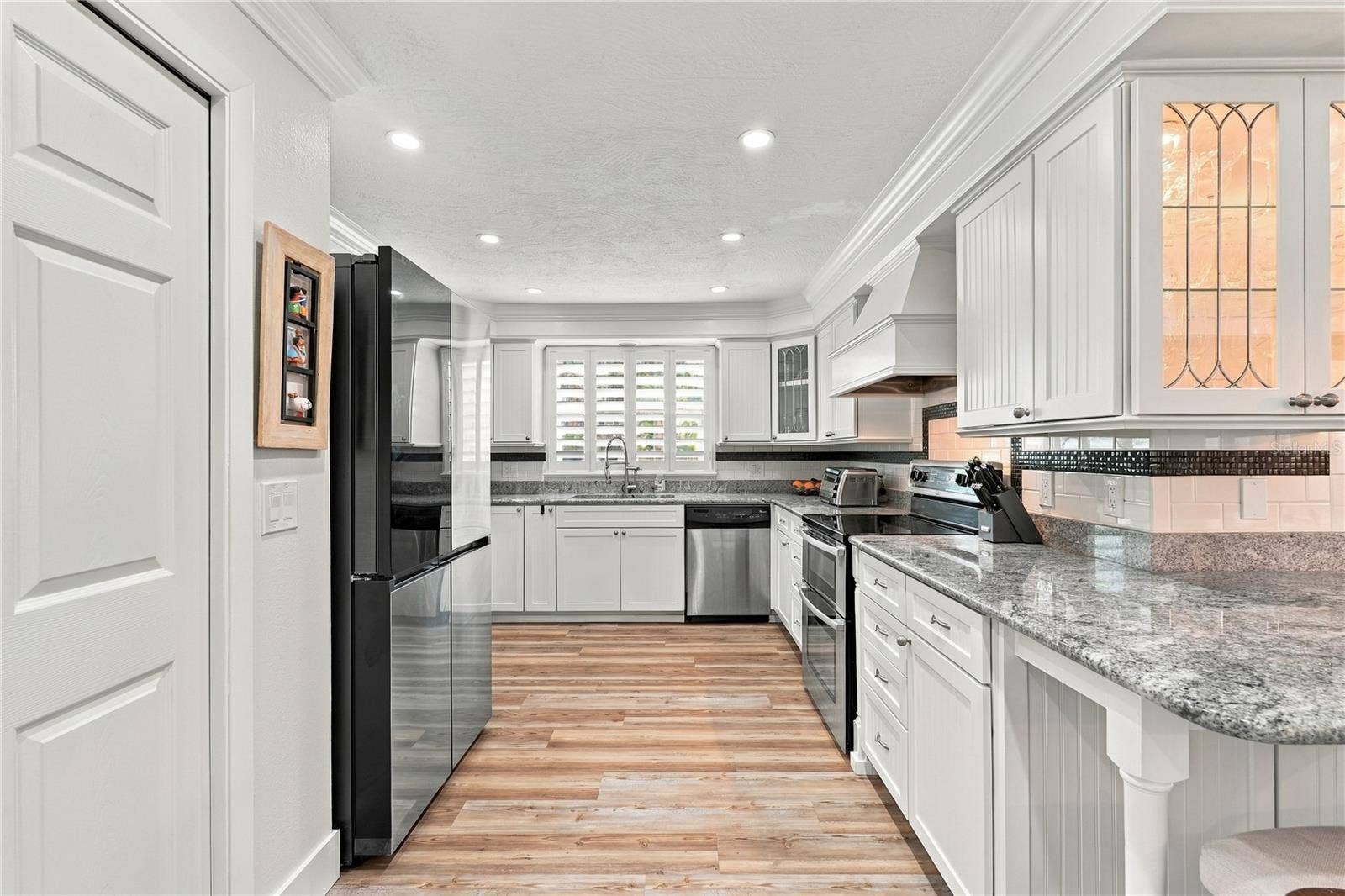 Beautiful Kitchen with Stainless steel appliances.