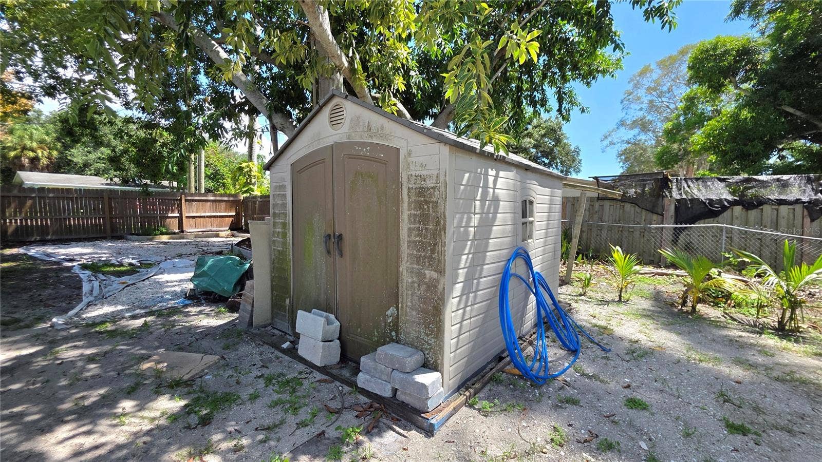 1702 26TH STREET W, Bradenton, FL 34205 Front/Side area of Yard and Property, Oversized Lot, Mature Landscaping
