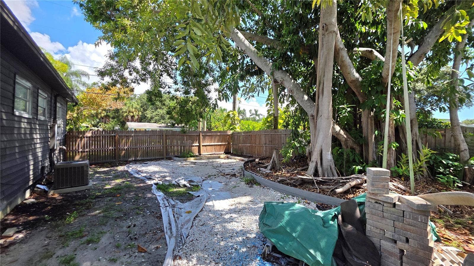 1702 26TH STREET W, Bradenton, FL 34205 Front/Side area of Yard and Property, Oversized Lot, Mature Landscaping