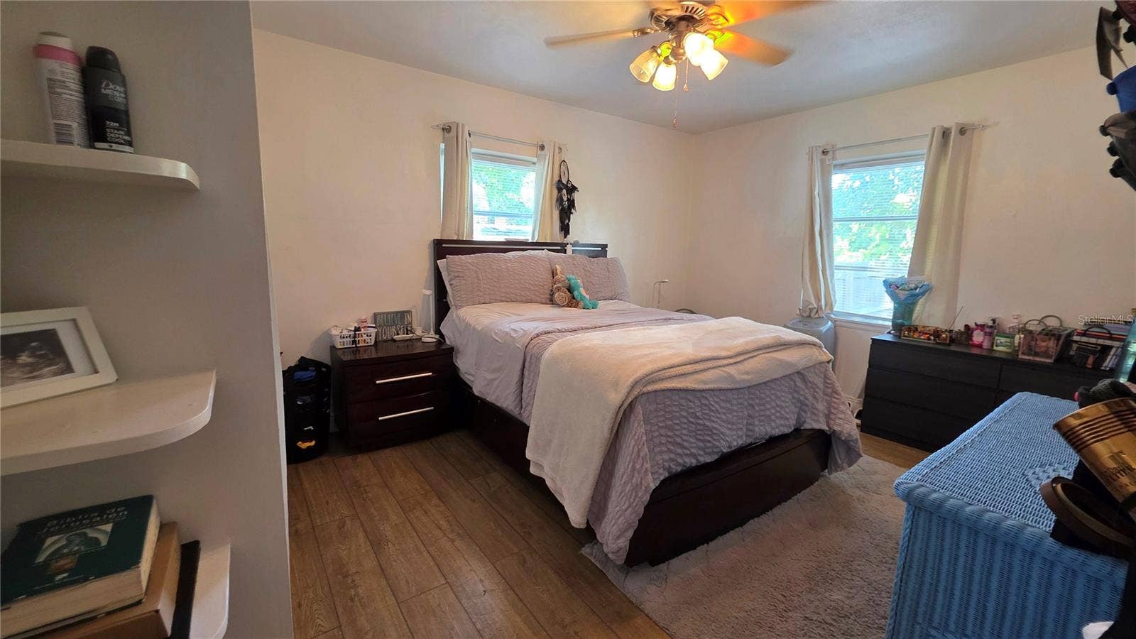 1702 26TH STREET W, Bradenton, FL 34205 Primary Bedroom with 2 Windows, Laminate Flooring, and En-Suite Bathroom (non-functioning)