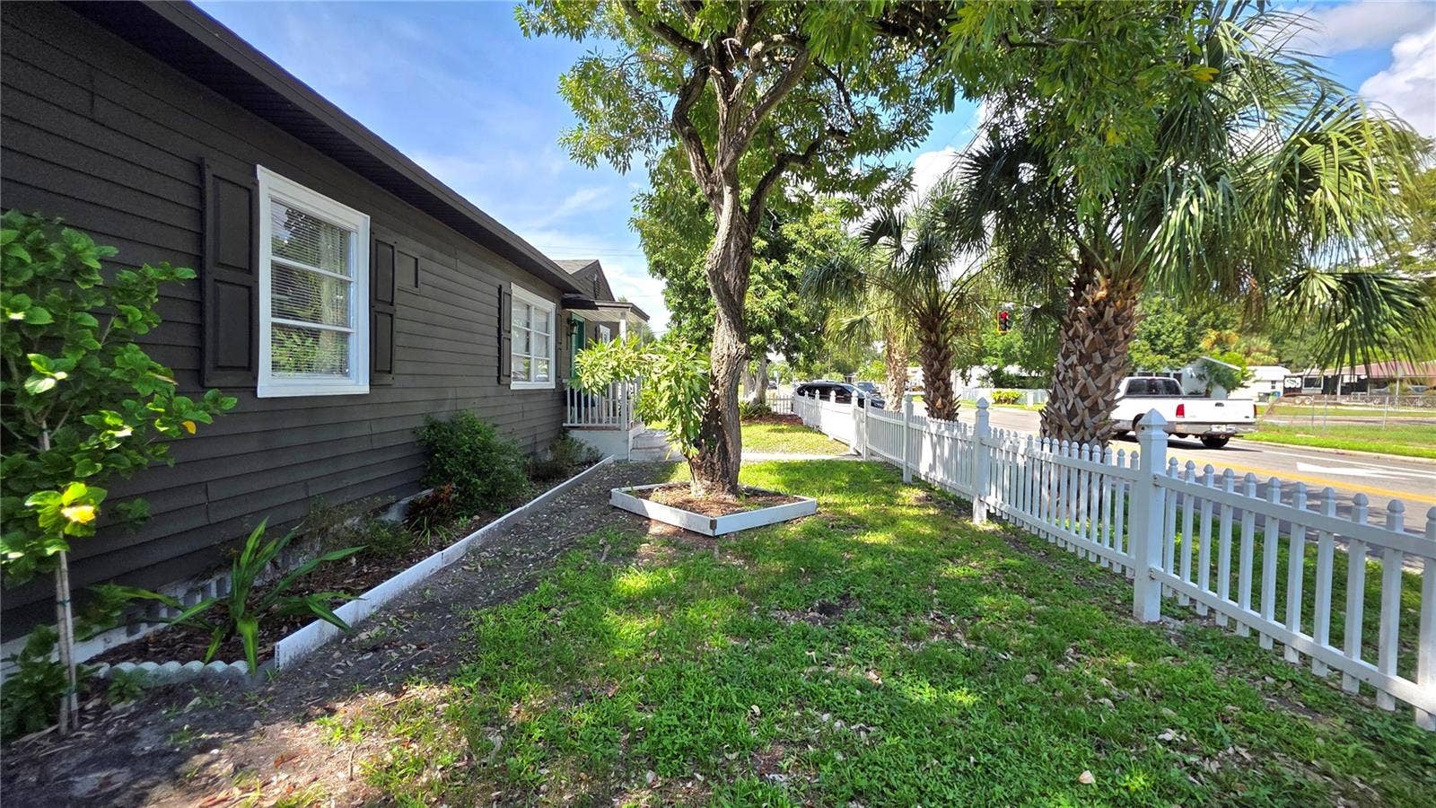 1702 26TH STREET W, Bradenton, FL 34205 Front of Home and Front Yard Entry, Fully Fenced