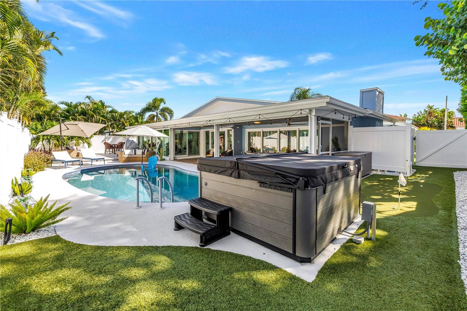 1114 2ND AVENUE S, Tierra Verde, FL 33715 Separate therapy hot tub with multiple therapeutic jets.