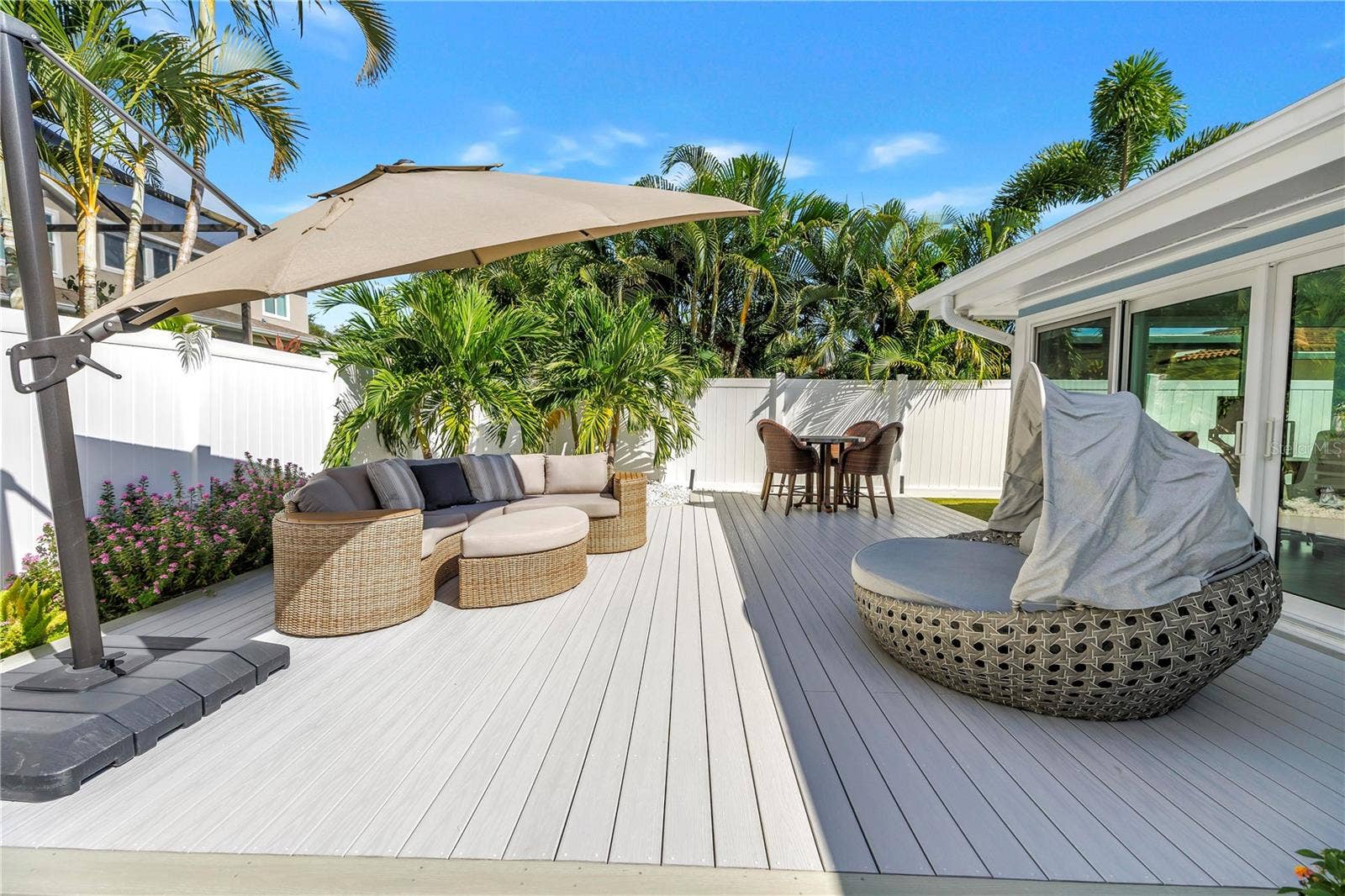 1114 2ND AVENUE S, Tierra Verde, FL 33715 Sliders open to your outdoor living and dining room.