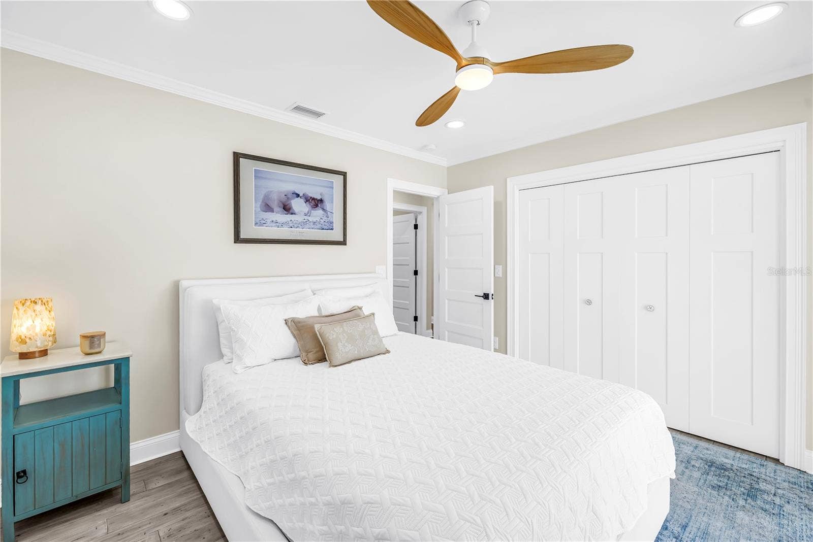 1114 2ND AVENUE S, Tierra Verde, FL 33715 Second bedroom with custom closet built-ins.