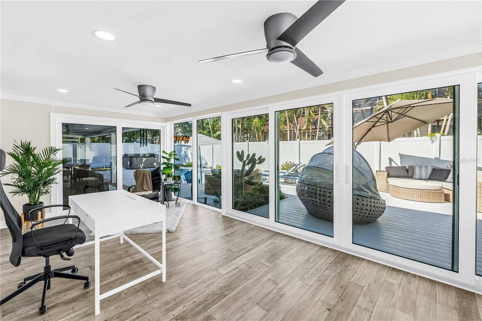 1114 2ND AVENUE S, Tierra Verde, FL 33715 Indoor/ outdoor living rooms!