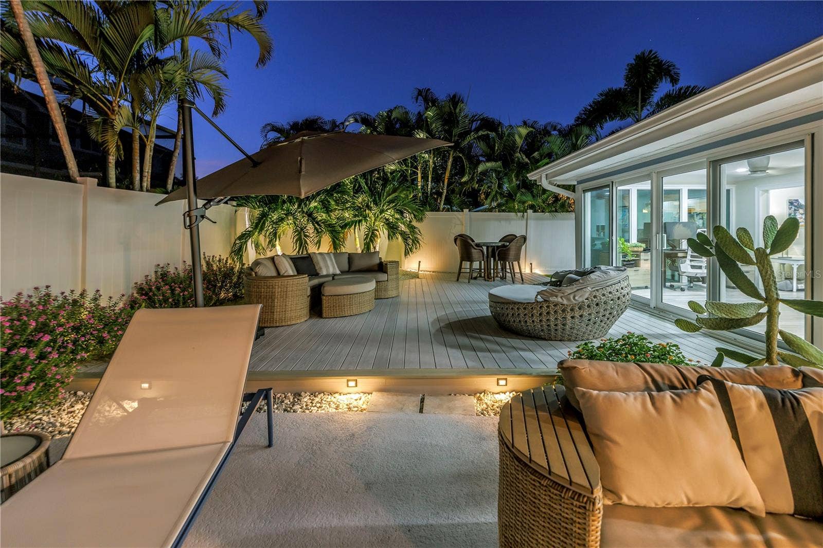 1114 2ND AVENUE S, Tierra Verde, FL 33715 Extensive custom lighting and electric for outdoor ambiance.