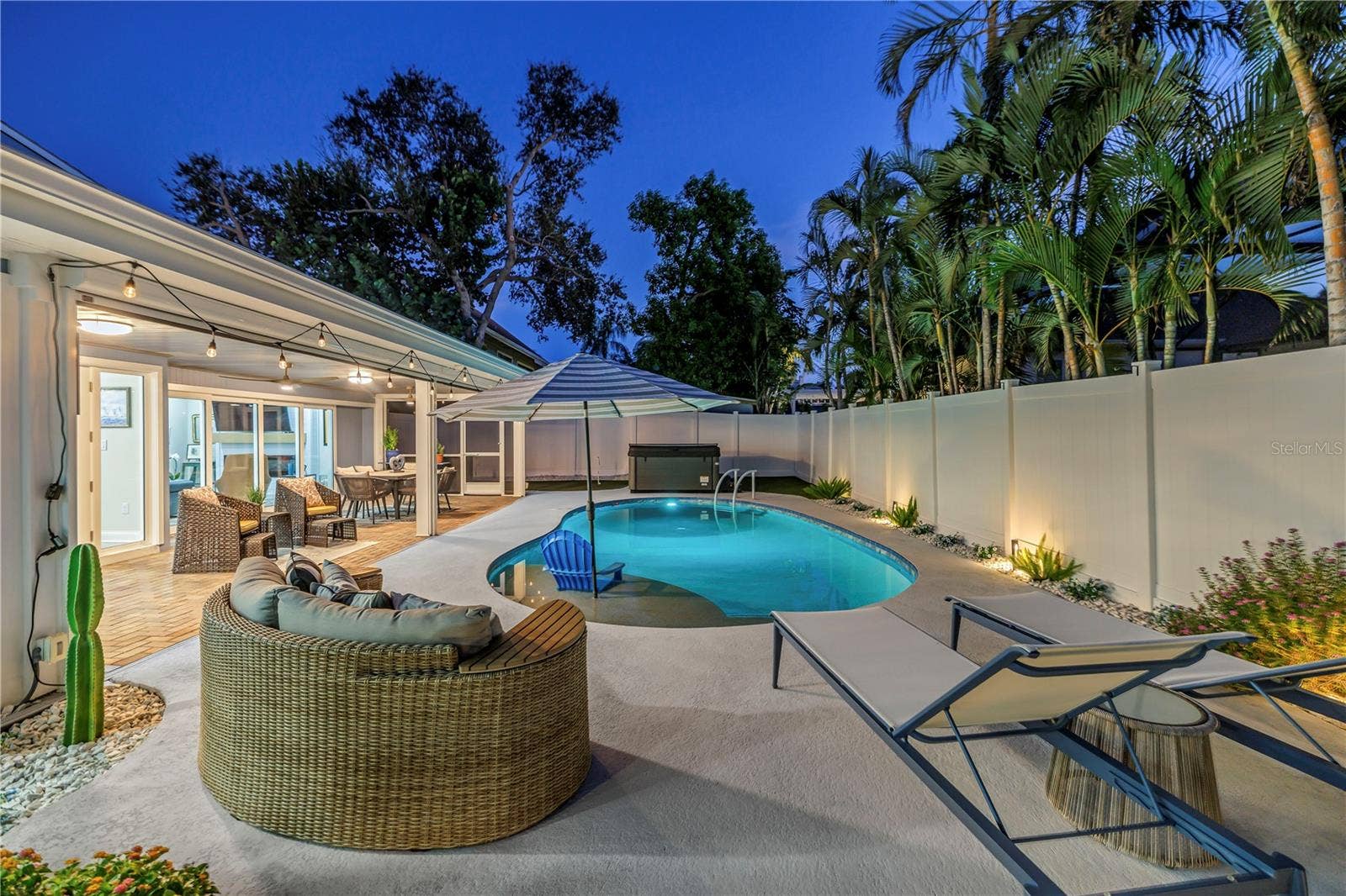1114 2ND AVENUE S, Tierra Verde, FL 33715 Covered and uncovered areas for your enjoyment.