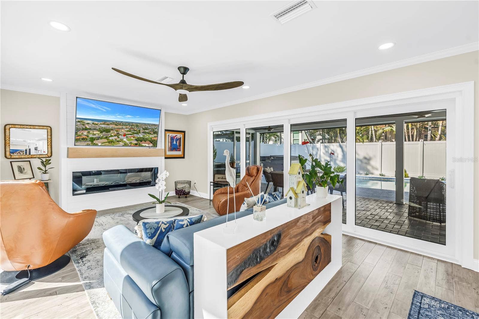 1114 2ND AVENUE S, Tierra Verde, FL 33715 Welcome in to rooms bathed in sunlight with panoramic views of the outdoors.