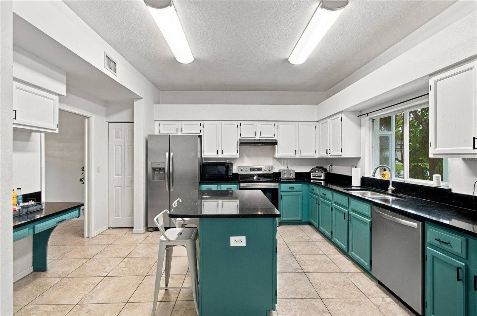 8102 STONEFIELD, Tampa, FL 33635 Coffee Bar/Meal Planning Desk in Kitchen
