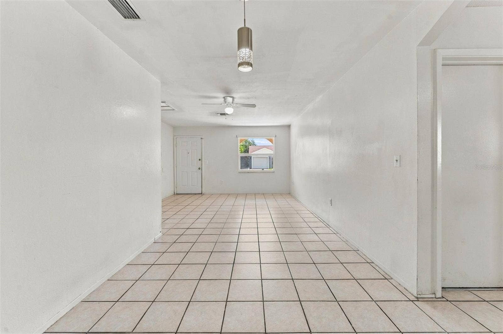 7303 RIVERBANK DRIVE, New Port Richey, FL 34655 Bright & Open Living Area