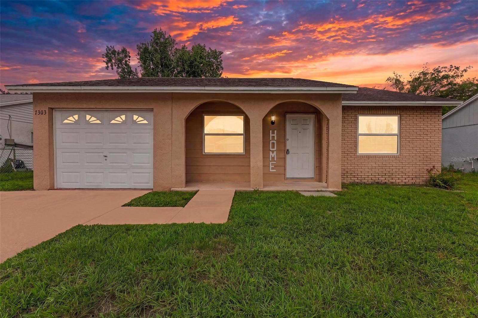7303 RIVERBANK DRIVE, New Port Richey, FL 34655 Twilight Exterior