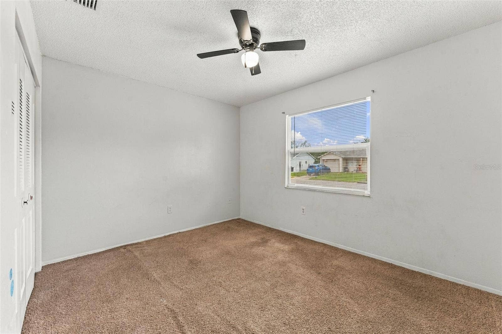 7303 RIVERBANK DRIVE, New Port Richey, FL 34655 Bedroom #2 with Ceiling Fan
