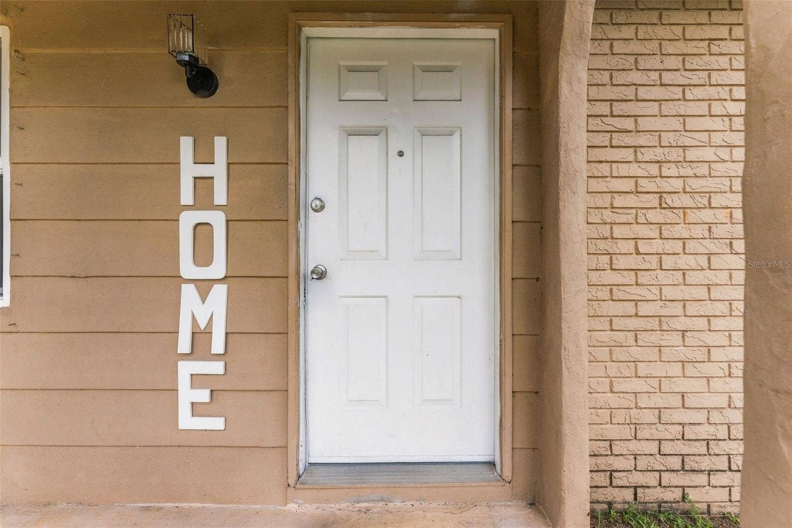 7303 RIVERBANK DRIVE, New Port Richey, FL 34655 Inviting Covered Front Entry