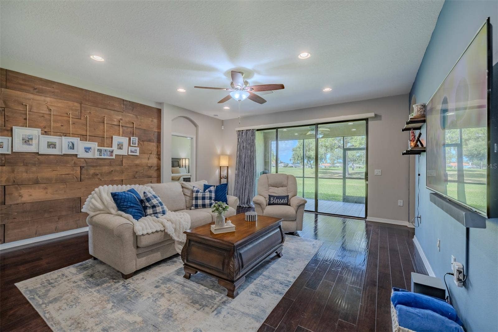 9123 RAES CREEK PLACE, Palmetto, FL 34221 Beautiful family room with natural lighting