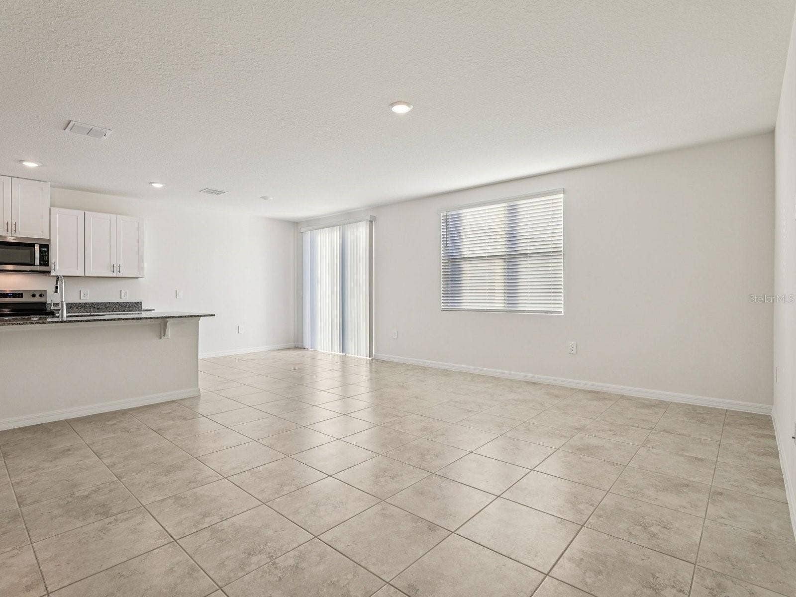 12580 HOMELAND DRIVE, Dade City, FL 33525 Photo is not of the actual home, but is an inspirational photo of builders model home and may depict options, furnishings, and/or decorator features that are not included