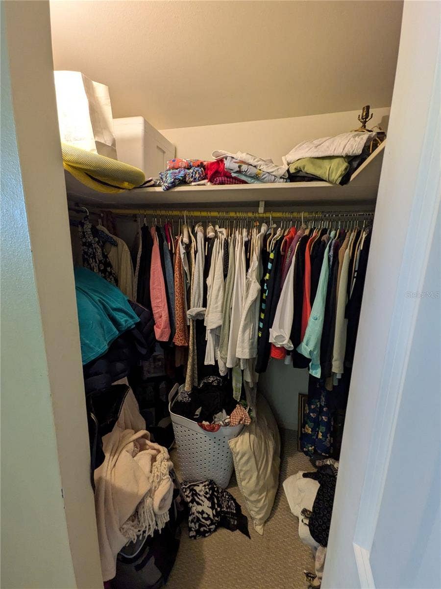 4885 1ST STREET NE, #216, St Petersburg, FL 33703 Master walk-in closet