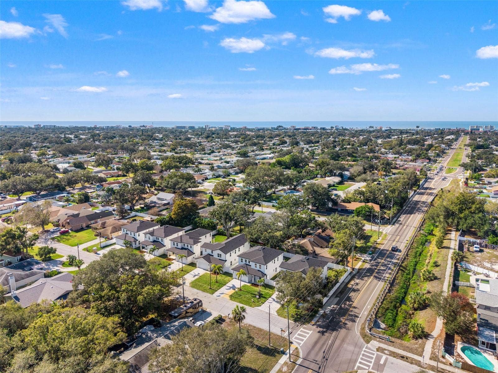 10154 HODSON PLACE, Seminole, FL 33776 aerial views with ocean in the background