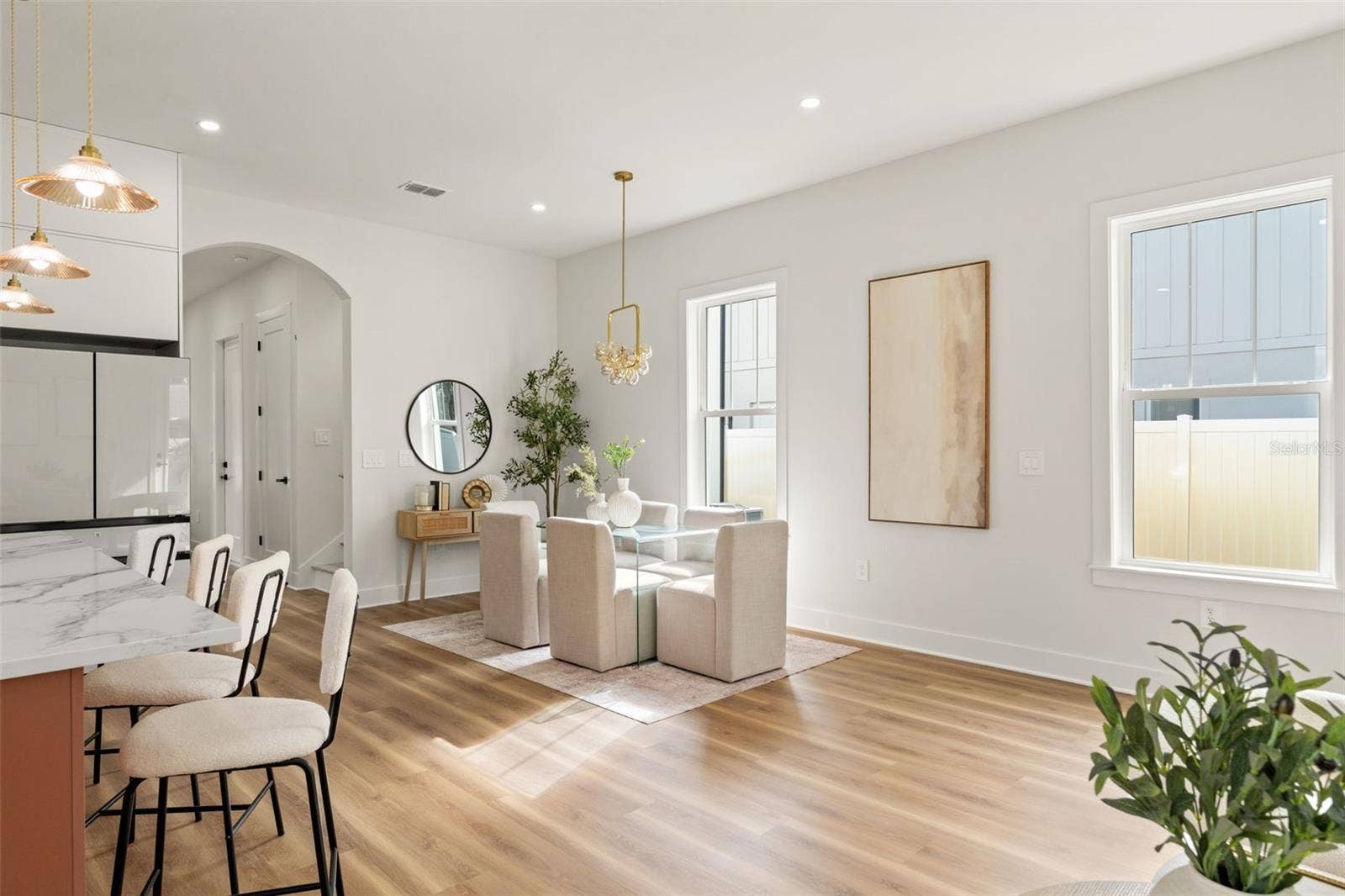 10154 HODSON PLACE, Seminole, FL 33776 Natural light in kitchen and dining