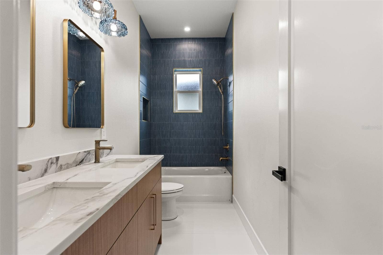 10154 HODSON PLACE, Seminole, FL 33776 upstairs secondary bath