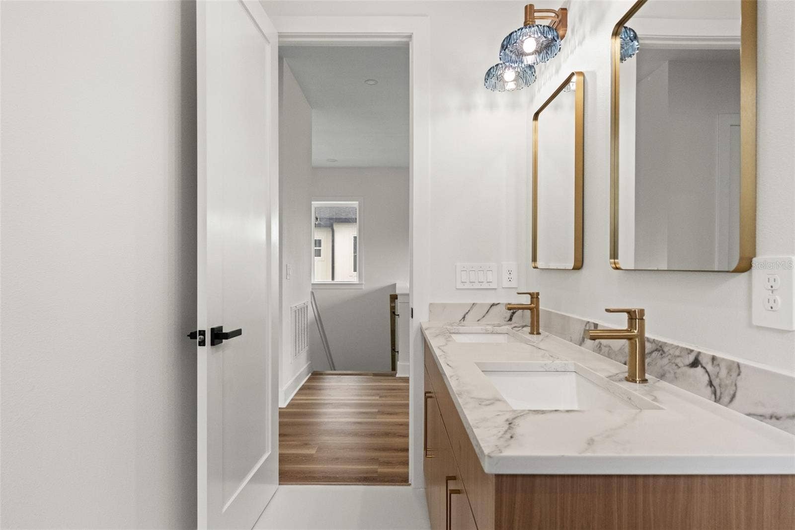 10154 HODSON PLACE, Seminole, FL 33776 secondary bath with dual sinks
