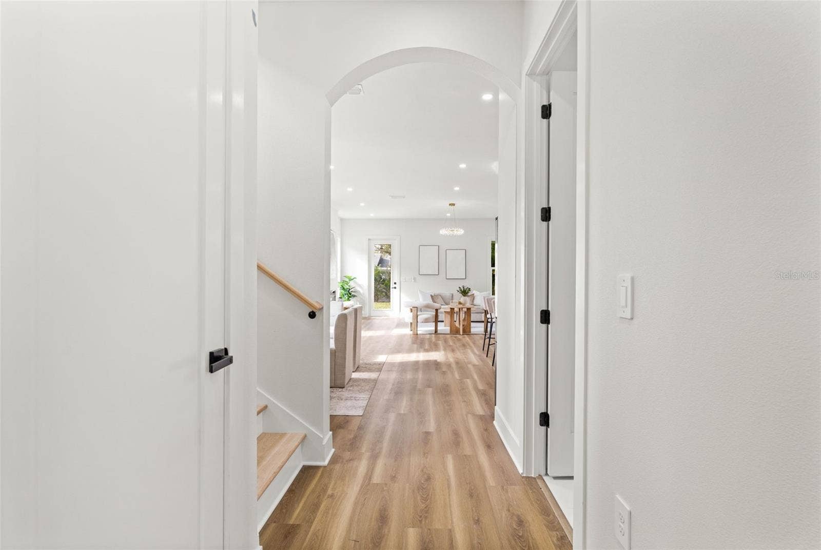 10154 HODSON PLACE, Seminole, FL 33776 entry way hall to great room/ kitchen