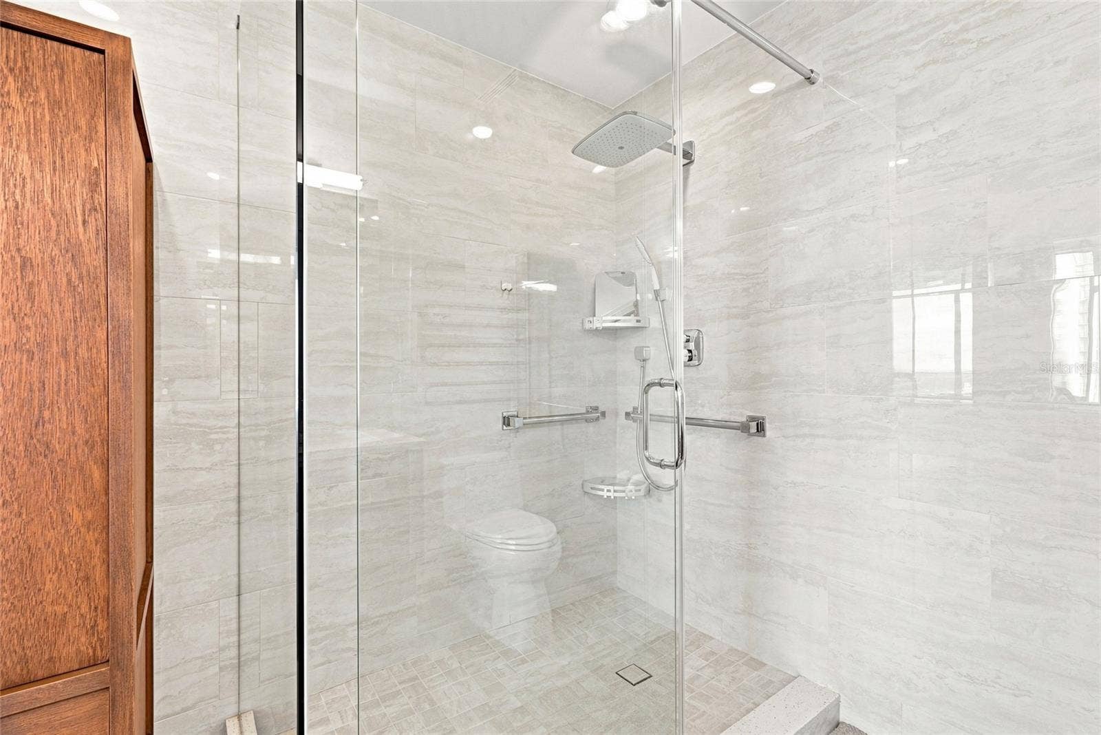 175 1ST STREET S, #2701, St Petersburg, FL 33701 enlarged walk-in shower