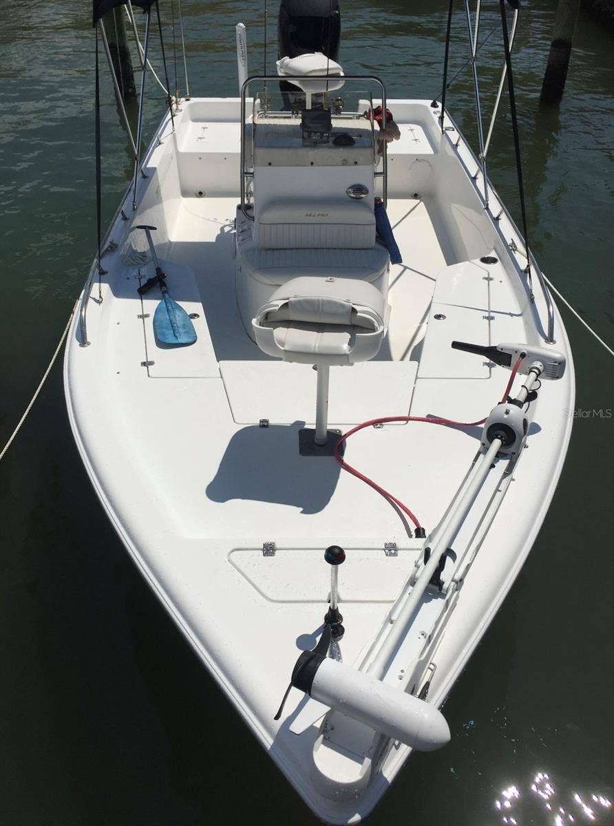 7740 BOCA CIEGA DRIVE, #201, St Pete Beach, FL 33706 Boat and trailer may be included with an acceptable offer, subject to separately agreed written terms.