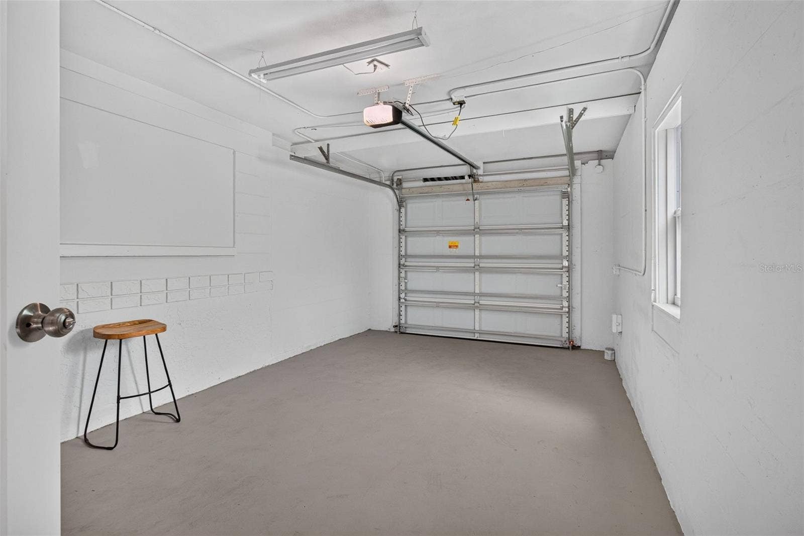 ONE CAR GARAGE / ENTRY THROUGH DINING ROOM