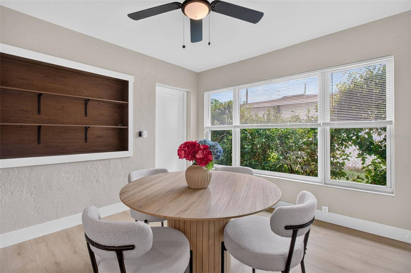 DINING ROOM WITH BUILT IN SHELVES