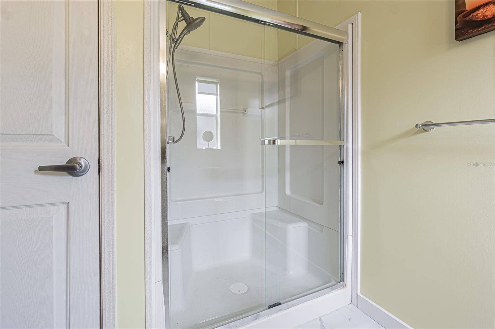 37232 NEUKOM AVENUE, Zephyrhills, FL 33541 Large shower with 2 seats