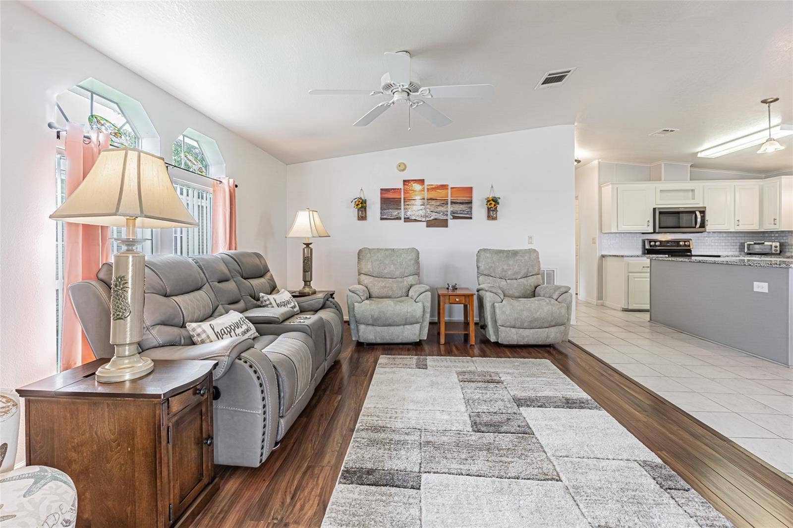 37232 NEUKOM AVENUE, Zephyrhills, FL 33541 Warm wood floors and valuted ceilings in this light, bright home!