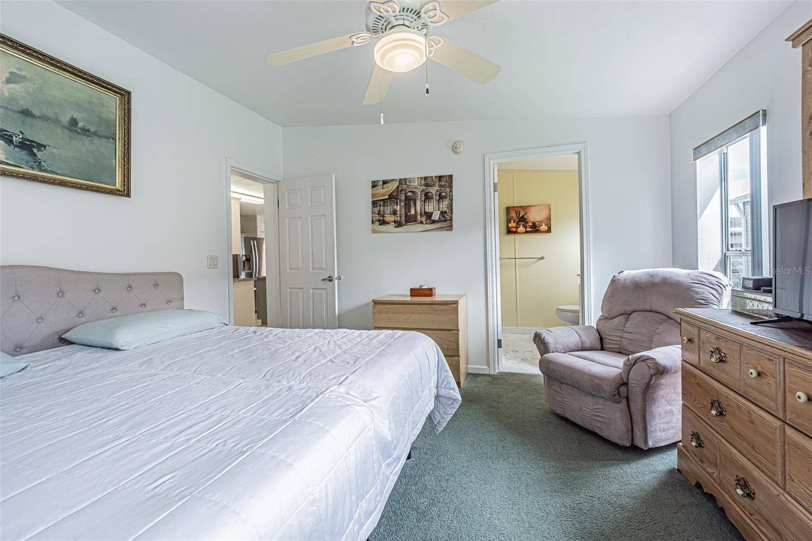 37232 NEUKOM AVENUE, Zephyrhills, FL 33541 Spacious room with a king bed and bath ensuite