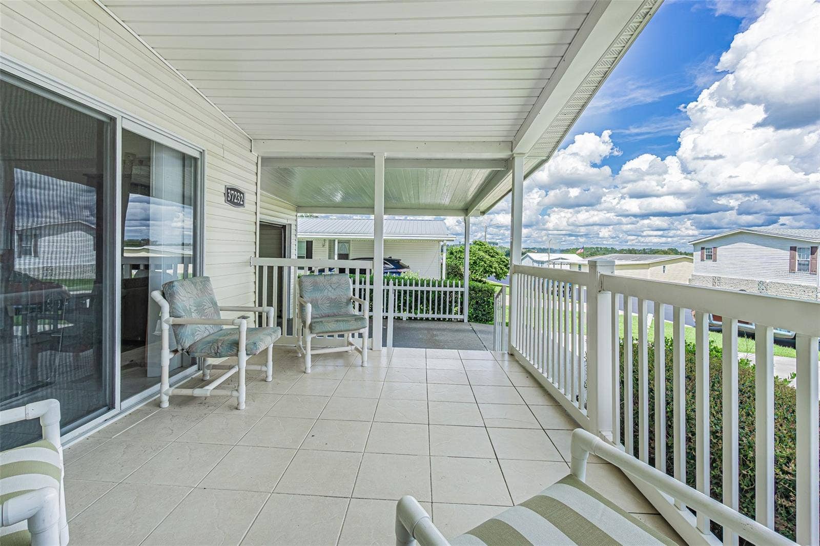 37232 NEUKOM AVENUE, Zephyrhills, FL 33541 Sit and relax on front porch!