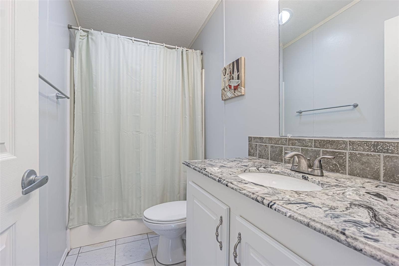 37232 NEUKOM AVENUE, Zephyrhills, FL 33541 Tub/shower in Secondary bathroom