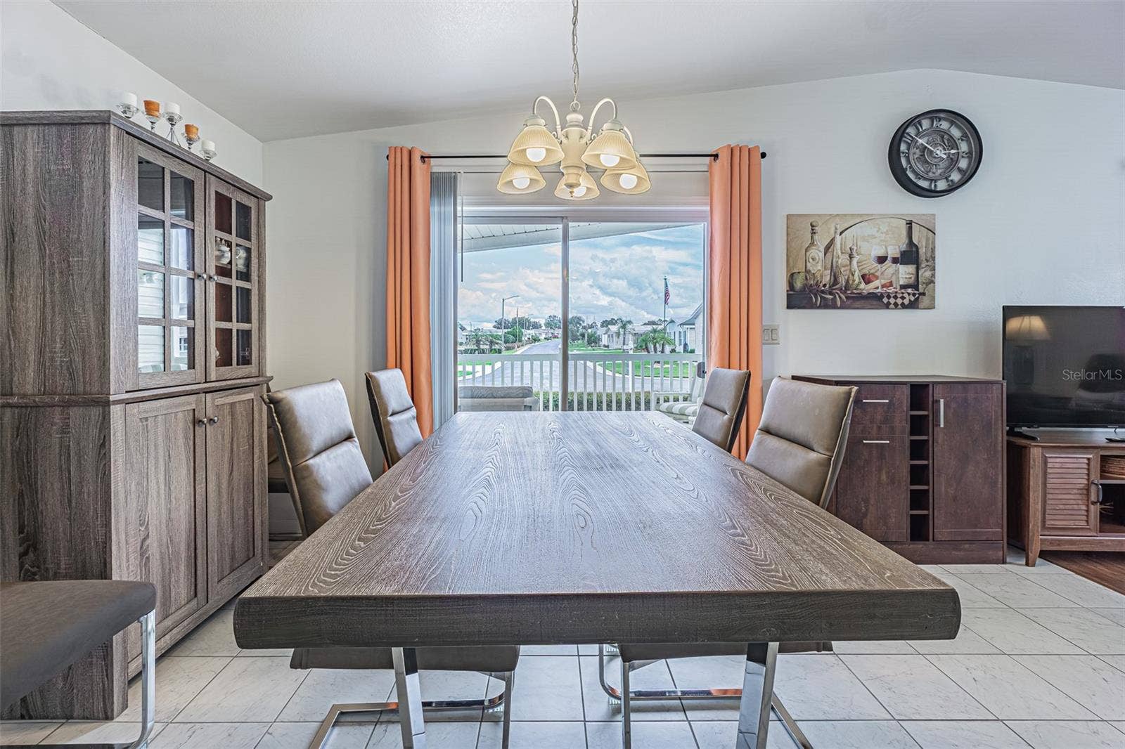 37232 NEUKOM AVENUE, Zephyrhills, FL 33541 Large dining space OPEN to living room and kitchen, with sunny Florida sky views!