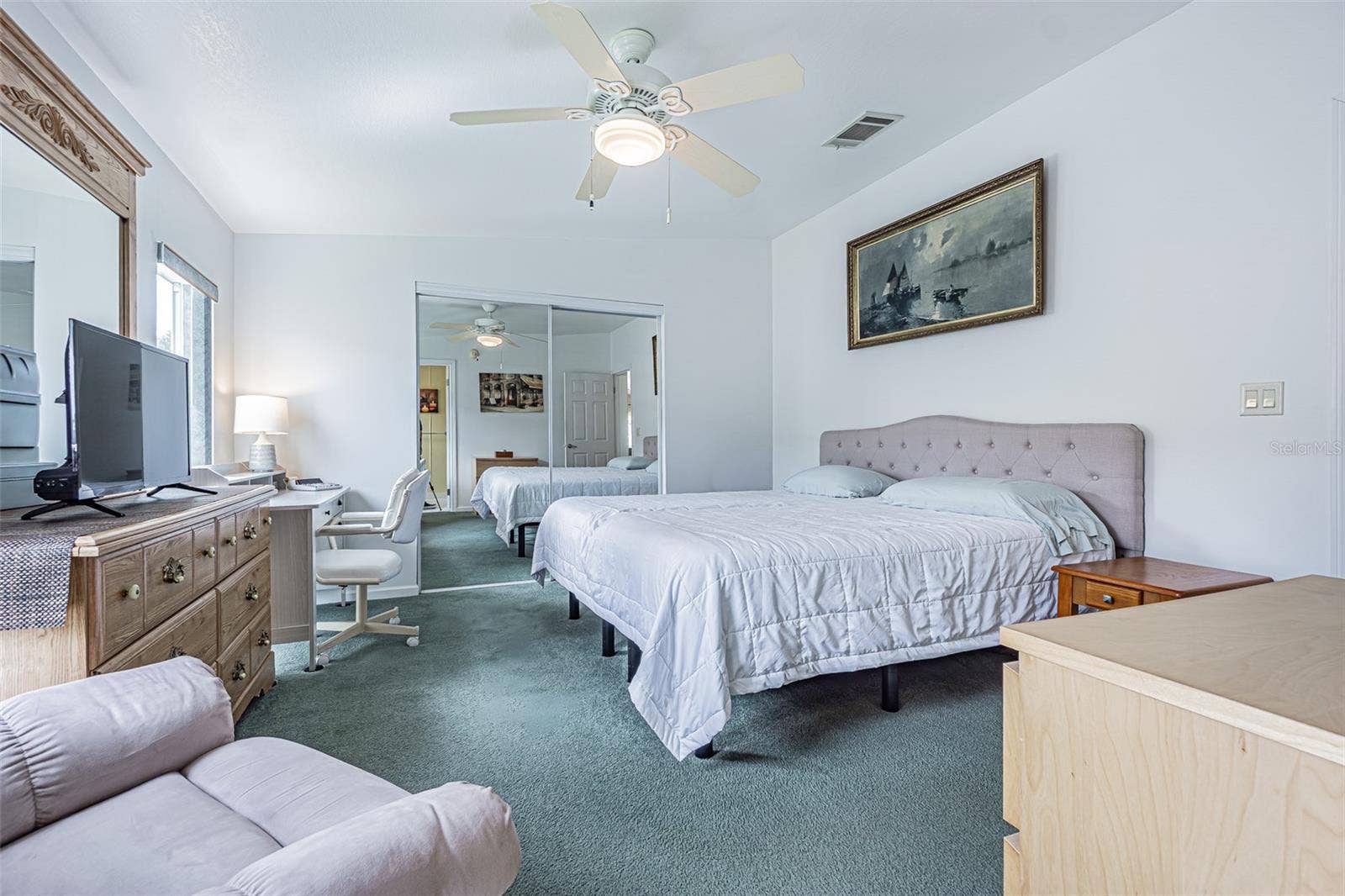 37232 NEUKOM AVENUE, Zephyrhills, FL 33541 Spacious owners retreat with wall to wall closet too